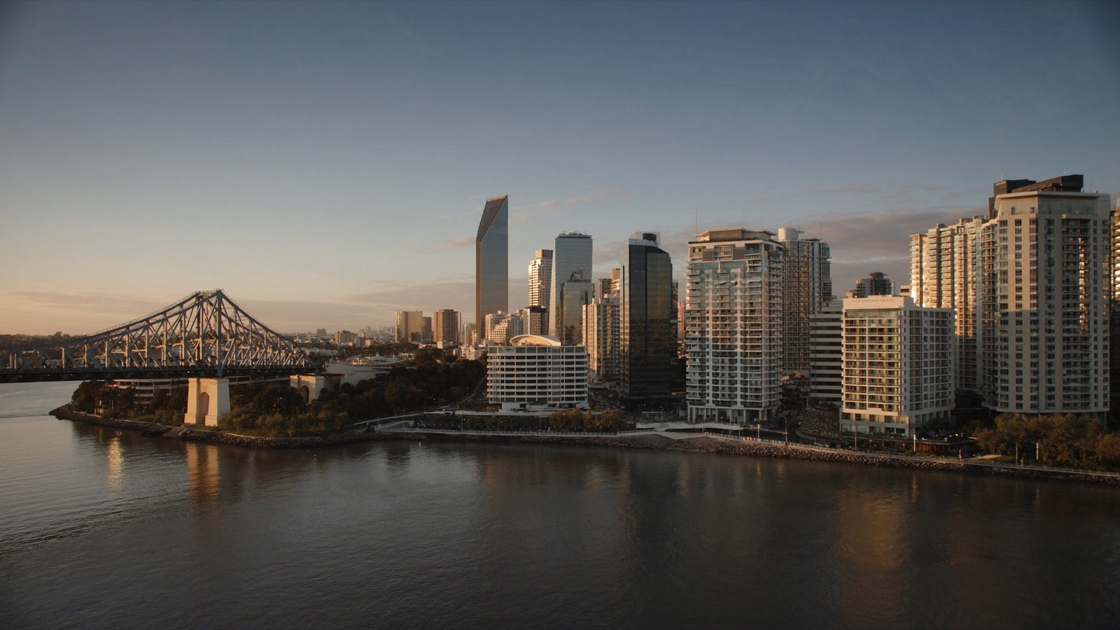Brisbane city skyline and the Brisbane River at golden hour