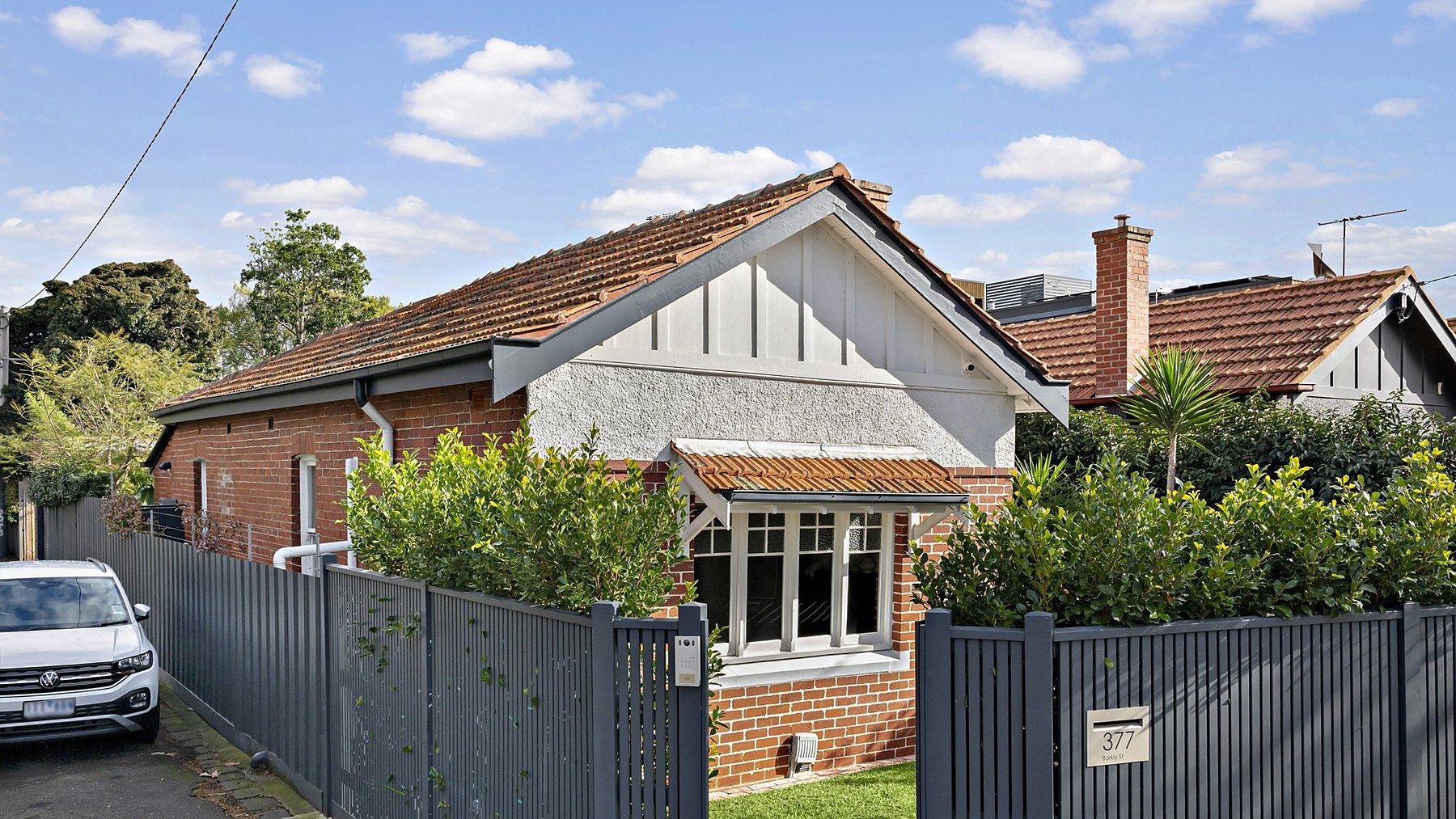 Street frontage of 377 Barkly Street, Elwood, a renovated red brick period home
